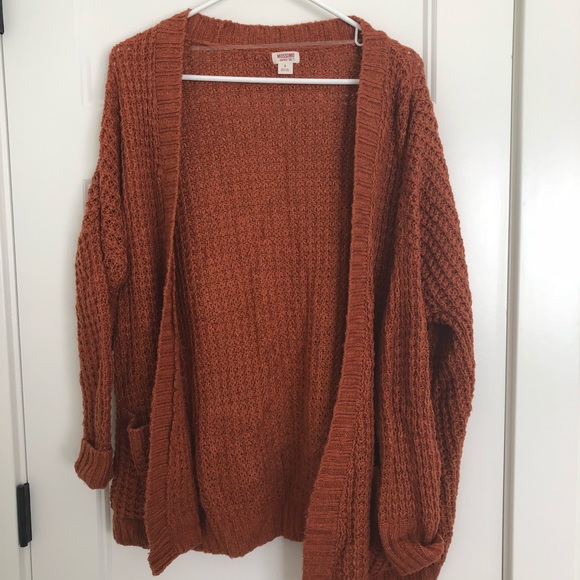 chunky orange cardigan